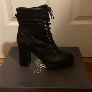 Vince Camuto combat heeled boots with box.